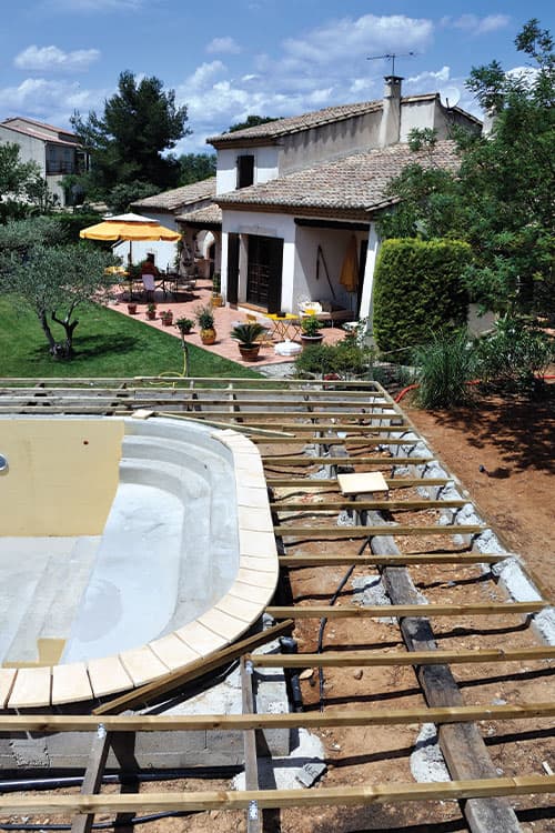 Aménagement terrain construction piscine